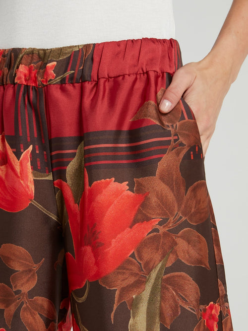 Красные широкие брюки в клетку с цветочным принтом