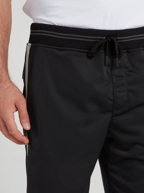 Черные шорты на резинке в полоску