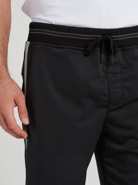 Черные шорты на резинке в полоску