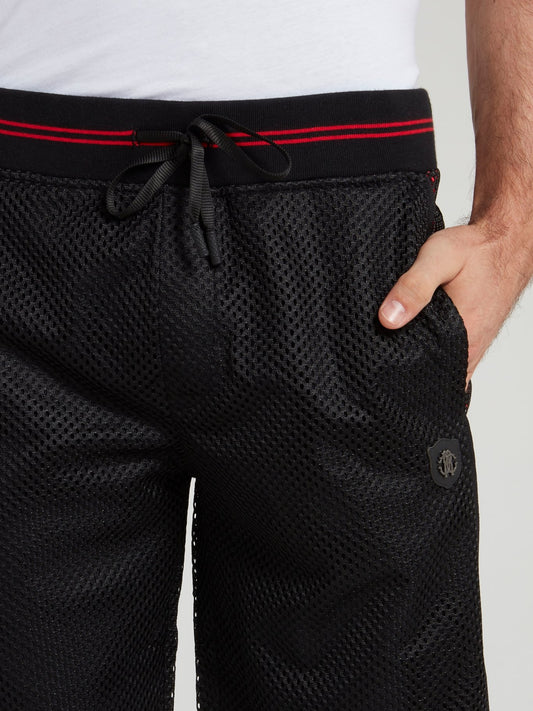 Черные шорты на шнуровке с перфорацией