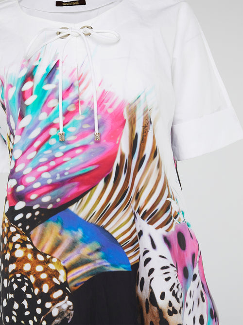 Get into the ultimate style with the Roberto Cavalli Printed Shirt Dress, a masterpiece that will elevate your wardrobe to new heights. Made with luxurious fabric and featuring a captivating print, this dress exudes elegance and sophistication. Stand out from the crowd and turn heads wherever you go in this stunning piece of art.
