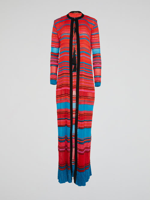 Wrap yourself in warmth and style with this luxurious knitted long coat from Roberto Cavalli. Made from the finest materials, this coat is sure to turn heads and make a statement wherever you go. Elevate your wardrobe with this unique and personal piece that is perfect for any occasion.