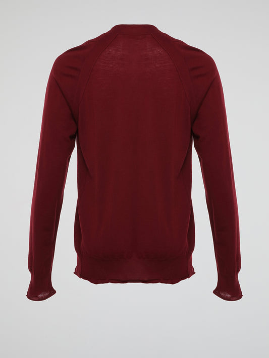 Wrap yourself in luxurious comfort with the Burgundy Knitted Sweatshirt by Roberto Cavalli. Crafted from ultra-soft materials, this enchanting garment envelops you in warmth while showcasing Cavalli's signature elegance. The stunning burgundy hue and intricate knitted pattern make this sweatshirt a standout piece, perfect for adding a dash of sophistication to your everyday wardrobe.