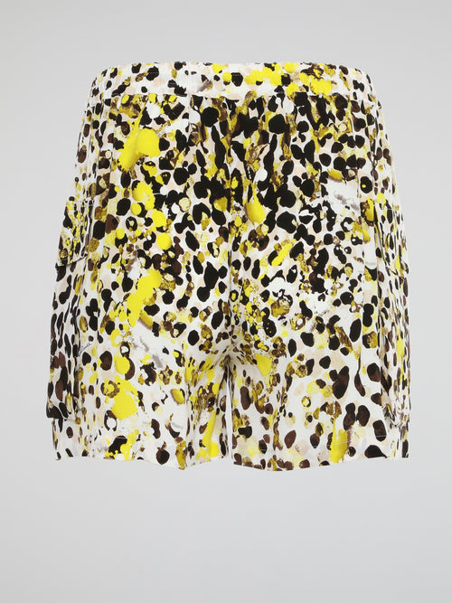 Elevate your summer style with these unique Paint Splatter Drawstring Cargo Shorts from Roberto Cavalli. Hand-painted splatters of color add an artistic flair to these classic cargo shorts, making them a standout piece in your wardrobe. Whether you're hitting the beach or exploring the city, these shorts are sure to turn heads and keep you comfortable all day long.