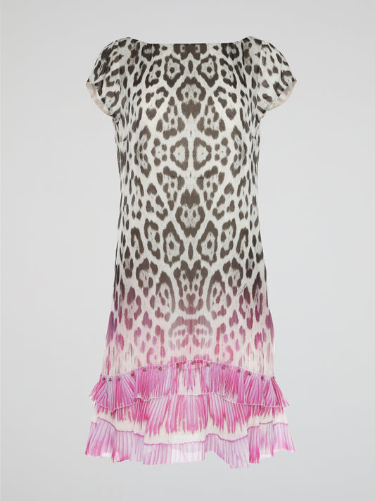 Step into the wild side of fashion with Roberto Cavalli's Animal Print Frill Hem Dress. This stunning piece combines the untamed beauty of leopard spots with the elegance of a frilled hem, creating a truly captivating look that commands attention. With its luxurious fabric and impeccable craftsmanship, this dress embodies the spirit of a fierce and fearless fashionista.