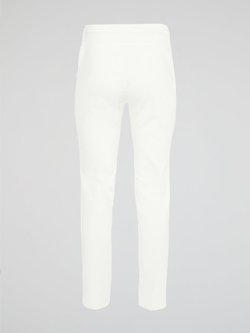Get ready to turn heads with these stunning White Skinny Fit Trousers by Akris Punto! Designed to flatter every curve, these trousers hug your body in all the right places, giving you a sleek and elegant silhouette. Perfect for both casual and formal occasions, these versatile pants are a must-have addition to your wardrobe!