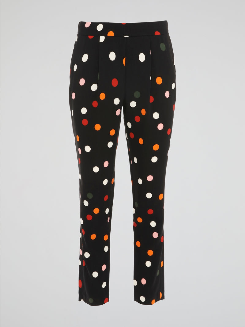 Step out in style with these Black Polka Dot Pleated Trousers from Akris Punto, a perfect blend of sophistication and playfulness. Crafted with meticulous attention to detail, these trousers feature a flattering pleated design that effortlessly elongates your silhouette. The whimsical polka dot pattern adds a touch of fun to your outfit, making these trousers a must-have for any fashion-forward individual.