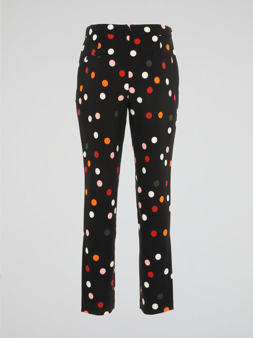 Step out in style with these Black Polka Dot Pleated Trousers from Akris Punto, a perfect blend of sophistication and playfulness. Crafted with meticulous attention to detail, these trousers feature a flattering pleated design that effortlessly elongates your silhouette. The whimsical polka dot pattern adds a touch of fun to your outfit, making these trousers a must-have for any fashion-forward individual.