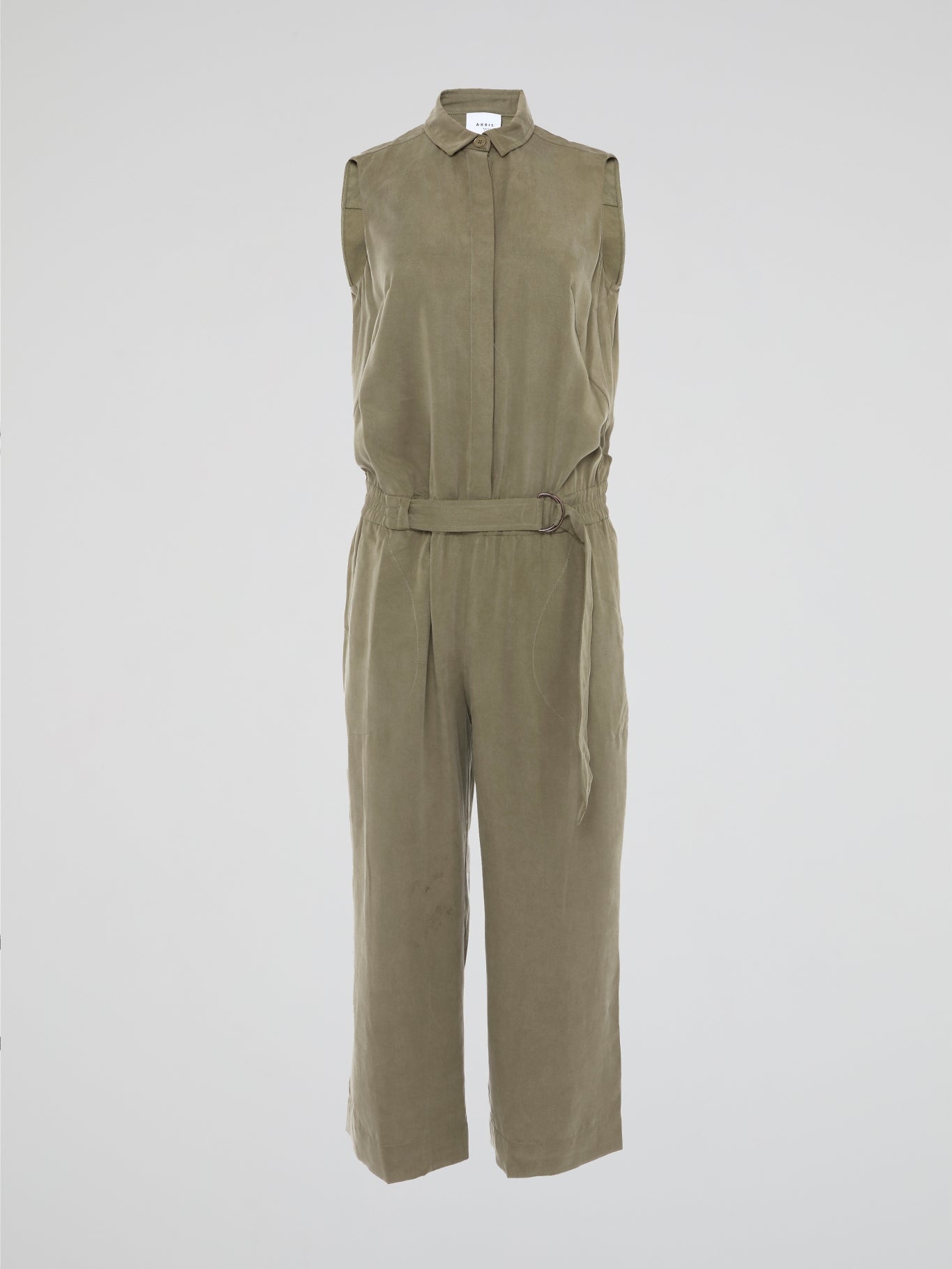 Step into effortless style with the Khaki Belted Jumpsuit from Akris Punto. This chic and versatile piece combines the sophistication of a tailored jumpsuit with the comfort of a belted waist, offering you the best of both worlds. Whether you're heading to the office or out for a night on the town, this jumpsuit is the epitome of modern elegance that will make heads turn wherever you go.