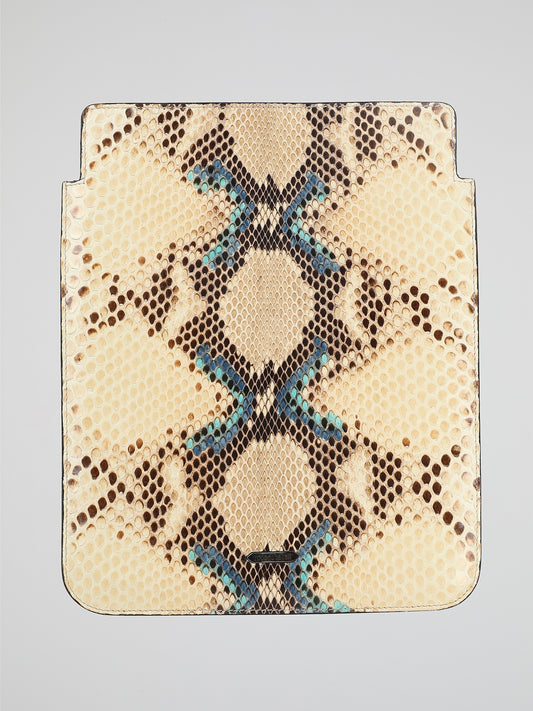 Embrace the wild side of technology with the Roberto Cavalli Snake Print Tablet Cover. This opulent accessory seamlessly combines edgy snake print with the iconic luxury of Roberto Cavalli. Crafted with precision, the tablet cover provides both protection and style, making it the ultimate statement piece for fashion-forward tech enthusiasts.