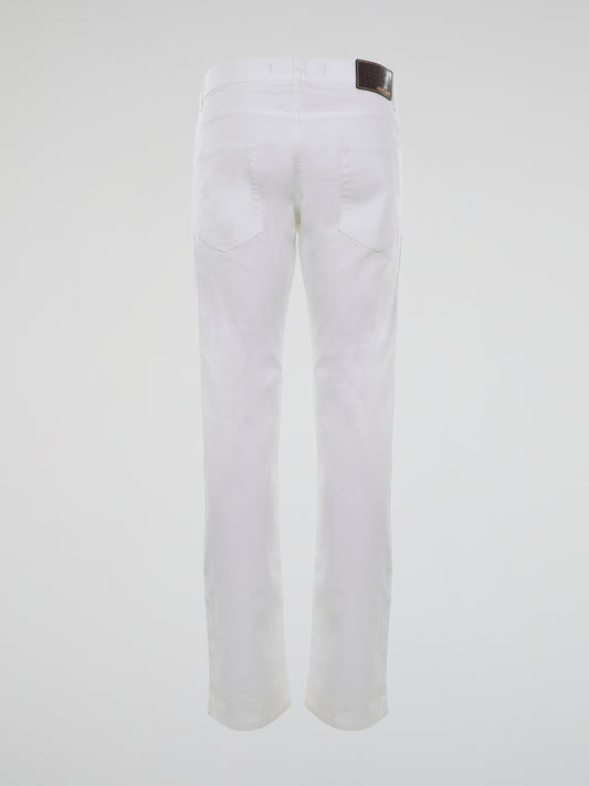 Introducing the epitome of impeccable style, the White Straight Cut Trousers by Roberto Cavalli. Crafted from luxuriously soft fabric, these trousers embrace elegance and sophistication with their sleek silhouette. Elevate your fashion game effortlessly, as you flaunt these timeless trousers that effortlessly blend comfort and class.