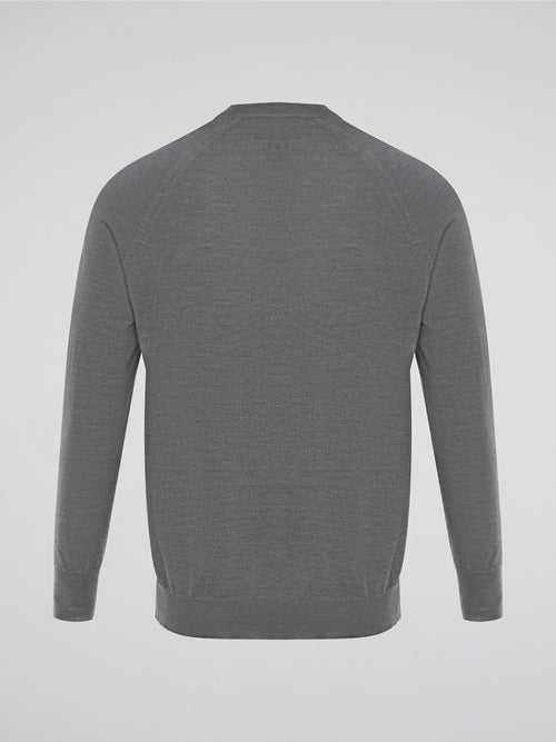 Introducing the epitome of chic comfort: the Grey Knitted Cardigan by Roberto Cavalli. Wrap yourself in luxury with its impeccably soft knit fabric, delicately woven to caress your body. This versatile and timeless piece elevates any outfit, effortlessly exuding sophistication and style.