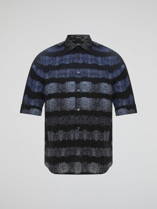 Step into the world of ultimate luxury with the Printed Button Up Shirt by Roberto Cavalli. This magnificent masterpiece effortlessly blends timeless elegance with a whimsical touch, showcasing an exquisite print that dances across the fabric. Crafted with meticulous attention to detail, this shirt is a sartorial statement that embodies sophistication and artistry, making you a true fashion trailblazer.