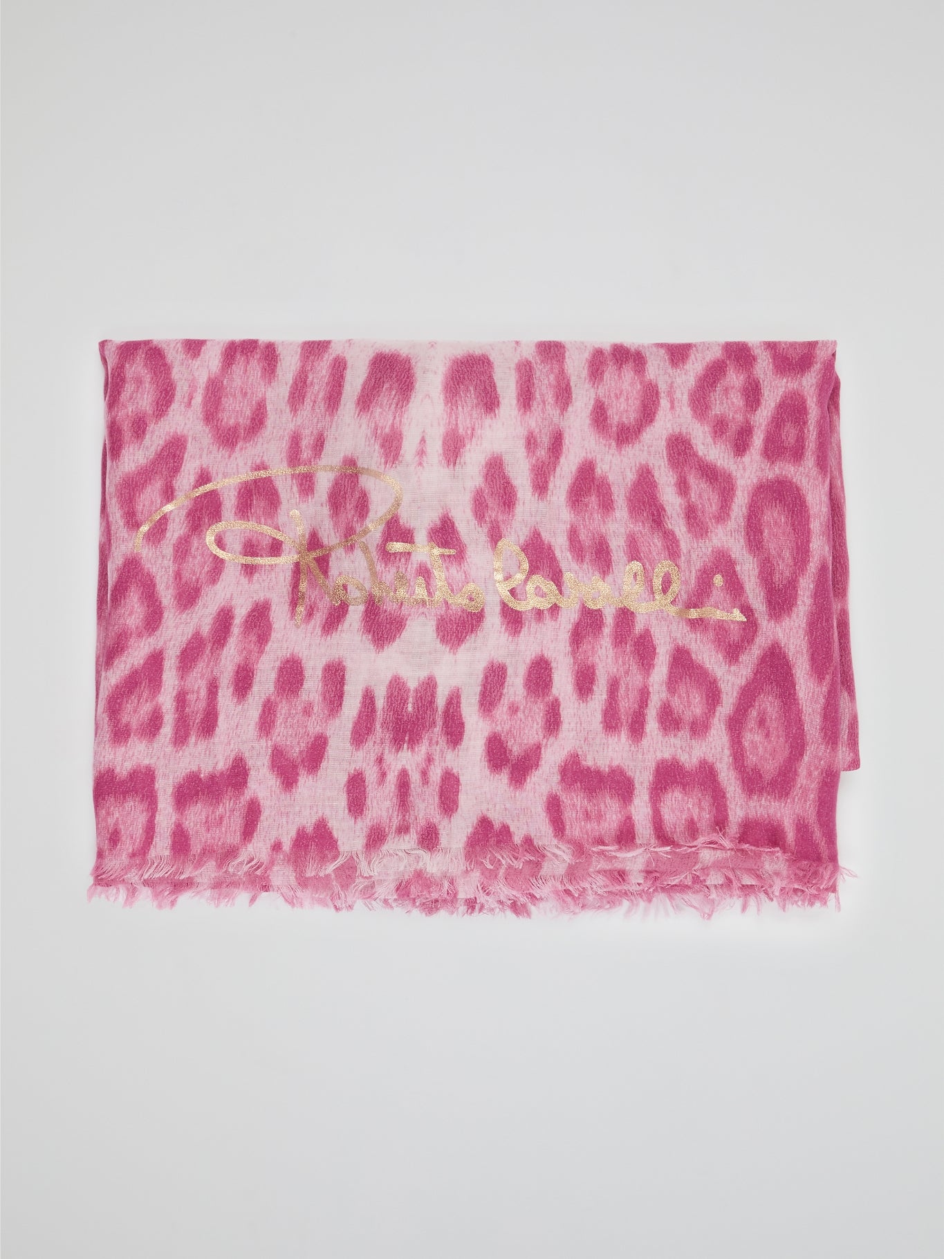 Wrap yourself in the wild elegance of this Pink Animal Print Scarf by Roberto Cavalli. The luxurious blend of soft fabric showcases a mesmerizing array of rosy hues, adorned with a fierce and playful animal motif. With each drape, let this statement accessory unleash your inner fashion safari, captivating attention wherever you go.