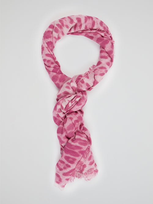 Wrap yourself in the wild elegance of this Pink Animal Print Scarf by Roberto Cavalli. The luxurious blend of soft fabric showcases a mesmerizing array of rosy hues, adorned with a fierce and playful animal motif. With each drape, let this statement accessory unleash your inner fashion safari, captivating attention wherever you go.
