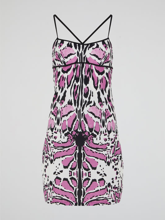 Unleash your wild side with the Animal Print Strap Dress by Roberto Cavalli. This captivating and daring dress features a mesmerizing print that evokes the untamed spirit of the jungle. The sleek and flattering silhouette, coupled with the luxurious fabric, makes it a fierce and fashionable choice for any occasion.