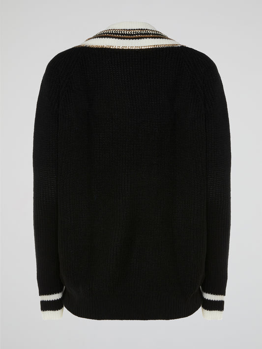 Introducing the Chain Embellished Sweater by Ella Luna - a sartorial masterpiece that effortlessly balances elegance and edginess. This captivating garment showcases a luxurious, soft-knit fabric, adorned with delicate chains strategically placed along the shoulders, adding a touch of glamour and intrigue. Perfect for fashion-forward individuals who dare to embrace their unique style, this sweater will effortlessly elevate any outfit, making you the epitome of sophistication wherever you go.
