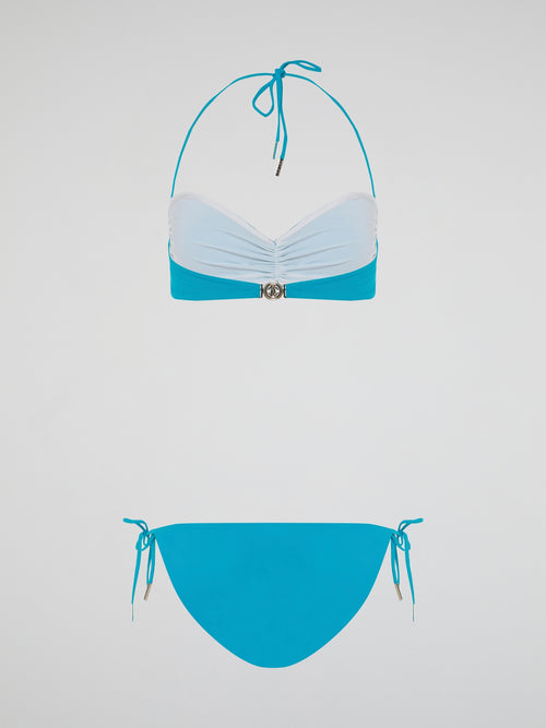 Dive into the depths of fashion with the Blue Snake Embellished Swimwear from legendary designer Roberto Cavalli. This luxurious and daring piece combines the grace of a siren with the boldness of a serpent, featuring a captivating blue snake pattern that will make heads turn at every poolside. Crafted with Cavalli's signature attention to detail and impeccable craftsmanship, unleash your inner goddess and conquer the waves in style.