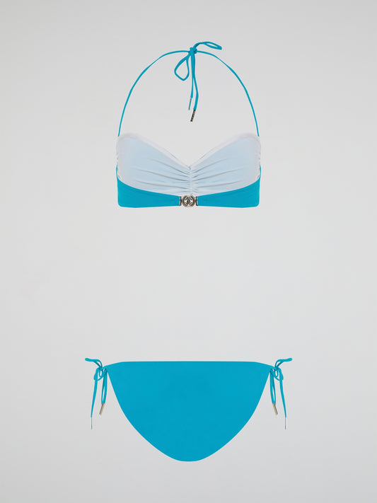 Dive into the depths of fashion with the Blue Snake Embellished Swimwear from legendary designer Roberto Cavalli. This luxurious and daring piece combines the grace of a siren with the boldness of a serpent, featuring a captivating blue snake pattern that will make heads turn at every poolside. Crafted with Cavalli's signature attention to detail and impeccable craftsmanship, unleash your inner goddess and conquer the waves in style.