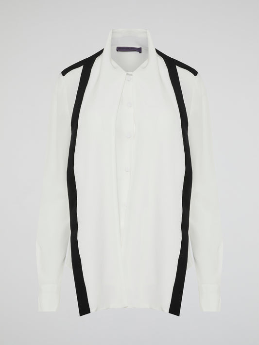 Introducing the White Contract Detailed Shirt by Emanuel Ungaro - a symphony of sophistication and style. Crafted with meticulous attention to detail, this shirt embodies elegance with its intricate contract stitching, adding a touch of modernity to a classic design. Perfect for the discerning gentleman who seeks to make a bold and refined statement, this shirt is the epitome of luxury fashion.