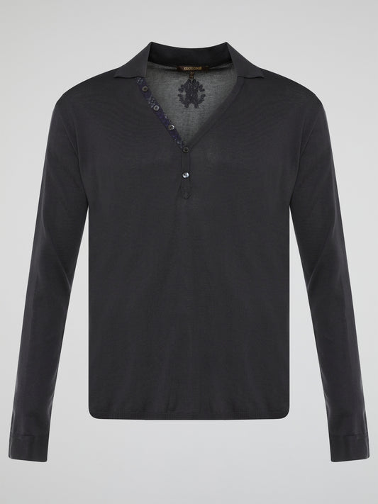 Elevate your style with the timeless elegance of our Black Long Sleeve Polo Shirt by Roberto Cavalli. Crafted with meticulous attention to detail, this wardrobe staple features a luxurious blend of comfort and sophistication. Whether you're headed to a casual brunch or a formal event, this Polo Shirt will effortlessly take you from day to night with its sleek design and iconic Cavalli logo.