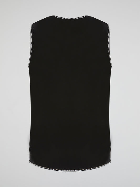 Step into a world of romantic charm with our mesmerizing Black Floral Embroidered Top by Parosh. Delicate blooms in rich hues beautifully cascade over the sheer fabric, creating a captivating visual play. This ethereal piece effortlessly blends sophistication with a hint of bohemian allure, making it a must-have for any fashion enthusiast.