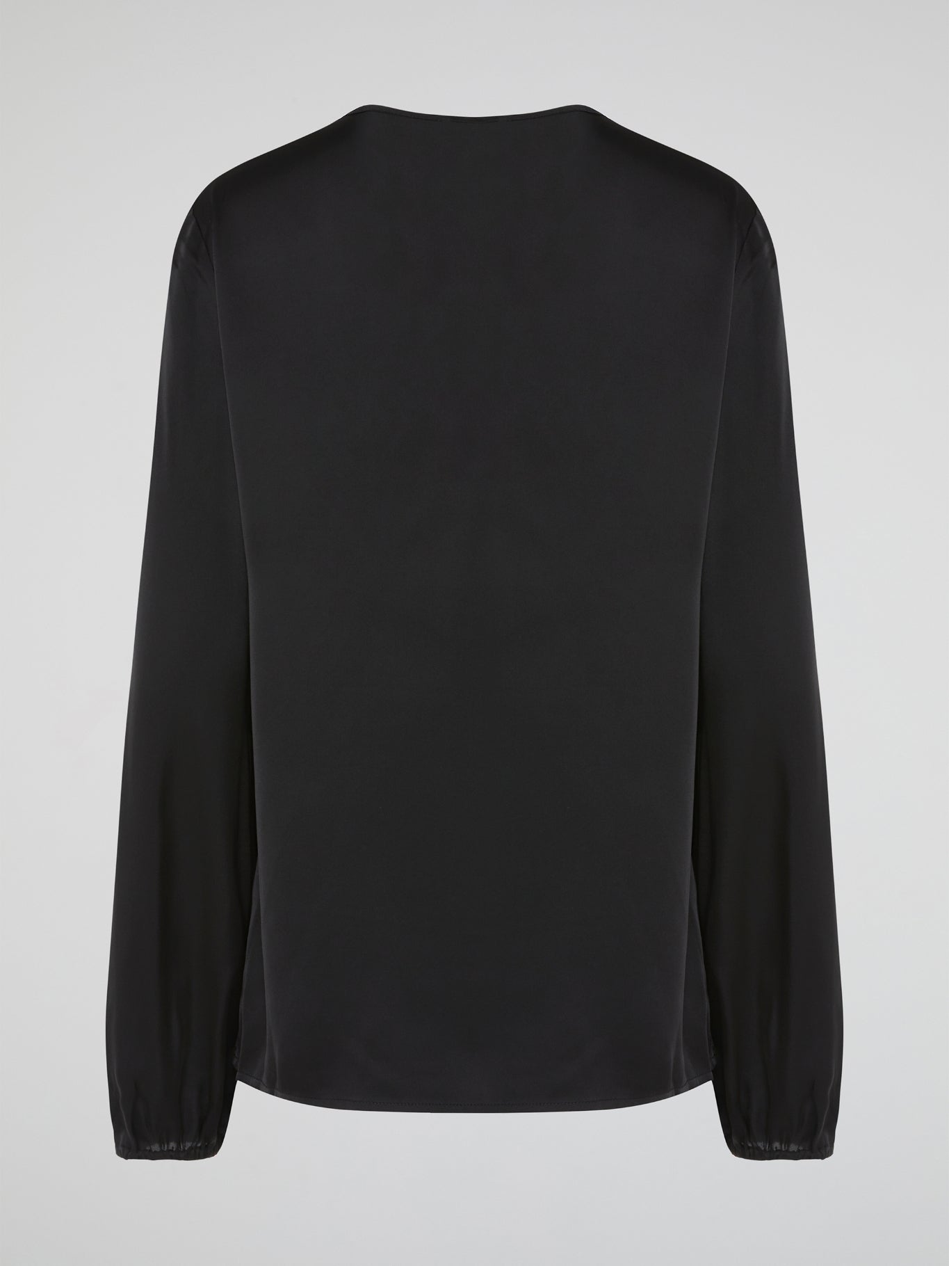 Introducing the Black Ruffle Bib Blouse by Parosh, where timeless elegance meets playful charm. Crafted with utmost precision, this statement piece features a beautifully sculpted ruffle bib that adds a touch of whimsy to your ensemble. With its sophisticated black hue and impeccable tailoring, this blouse is a must-have addition to your wardrobe, seamlessly elevating any outfit from day to night.