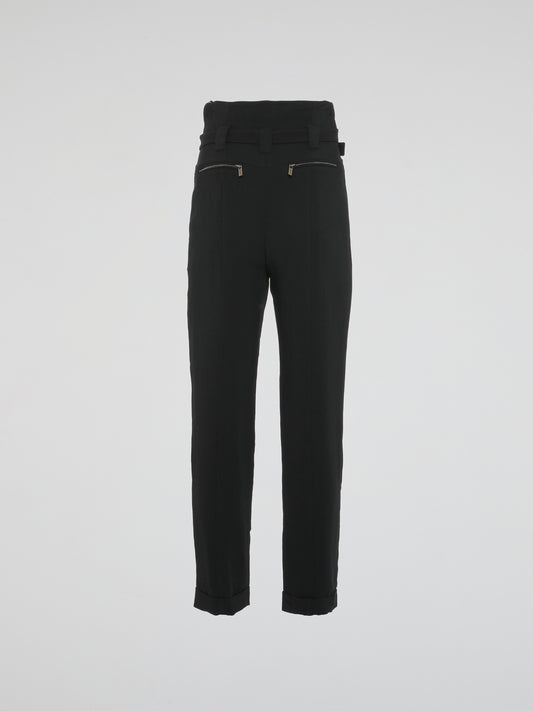 Embrace your inner fashion icon with these Black Frill Waist Pants by Roberto Cavalli. Combining elegance and edginess, these pants feature a unique frill waist detailing that adds a touch of playfulness to any outfit. Crafted with utmost precision and luxury, these pants are perfect for both casual chic days and glamorous nights out.