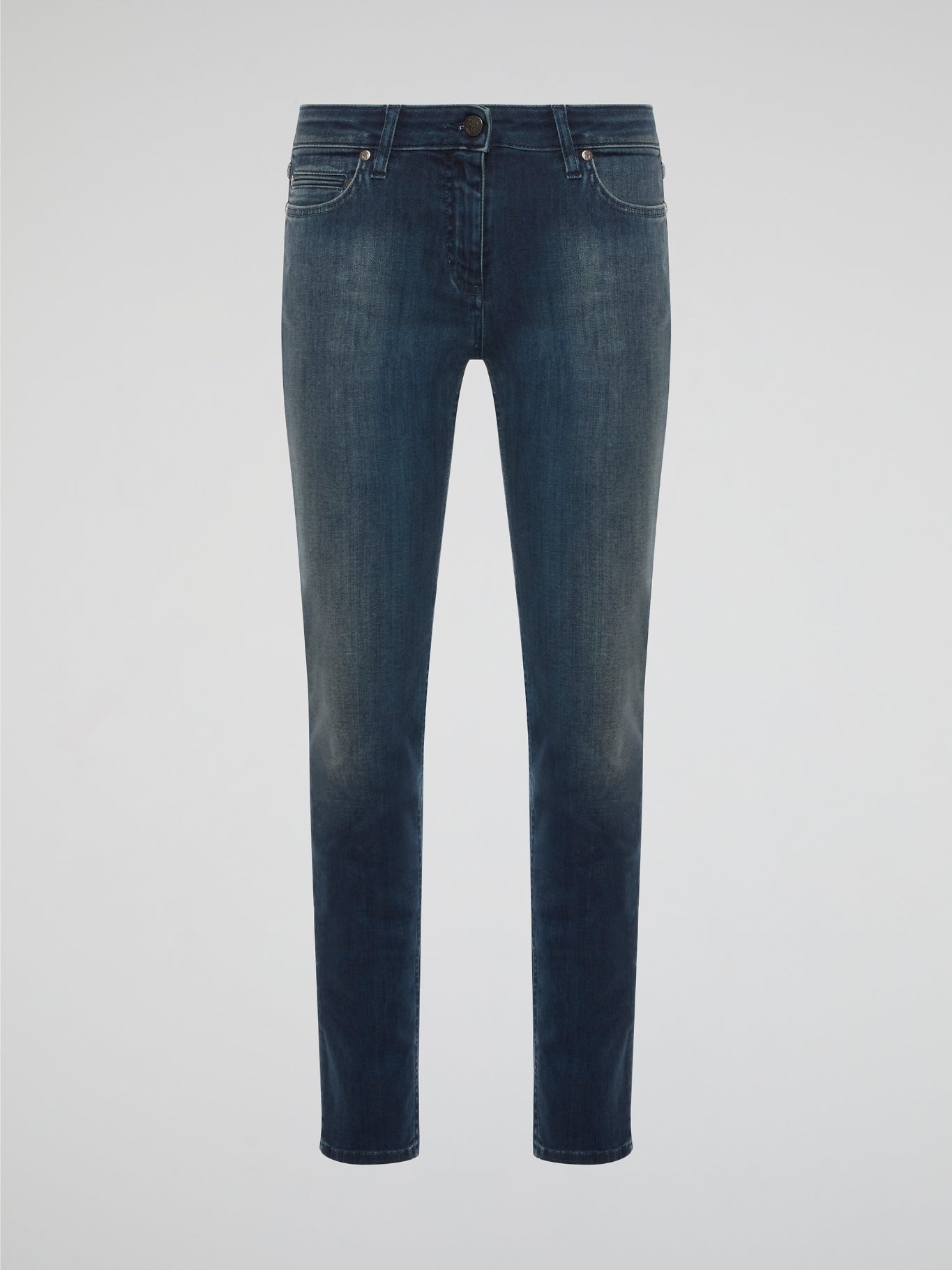 Elevate your denim game with these Stone Washed Skinny Denim Jeans by Roberto Cavalli, designed to hug your curves in all the right places. The unique stone wash finish gives these jeans a worn-in, vintage look that sets them apart from your average pair of skinny jeans. Pair them with a sleek blouse and heels for a chic and edgy urban look that will turn heads wherever you go.