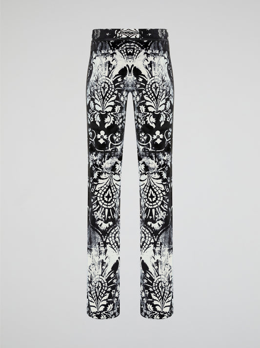 Elevate your wardrobe with our Roberto Cavalli Printed Skinny Trousers, designed to make a bold fashion statement. Crafted from luxurious fabrics and featuring a vibrant print, these trousers are the perfect combination of style and comfort. Whether you're heading to the office or a night out on the town, these trousers will ensure all eyes are on you.