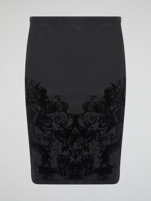 Elevate your office attire with this stunning grey printed pencil skirt from iconic designer Roberto Cavalli. The intricate pattern adds a touch of sophistication and style, making you stand out from the crowd. Pair it with a crisp white blouse and heels for a polished and fashion-forward look that will turn heads wherever you go.