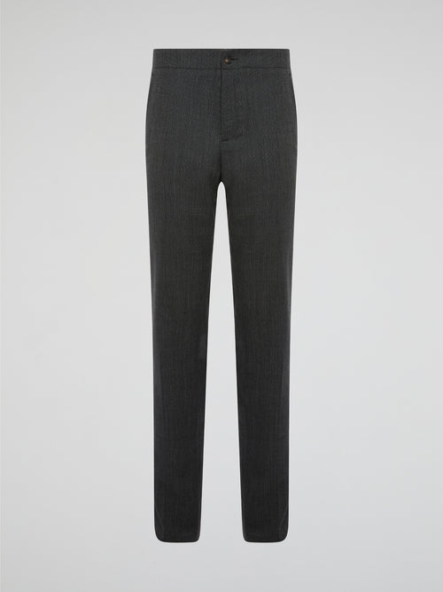 Elevate your everyday wardrobe with these sleek Grey Slim Fit Trousers by Roberto Cavalli, designed for the modern man who values style and sophistication. Made from high-quality fabric with a tailored fit, these trousers effortlessly blend comfort and luxury. Whether you're heading to the office or a night out on the town, these trousers will ensure you look polished and on-trend.
