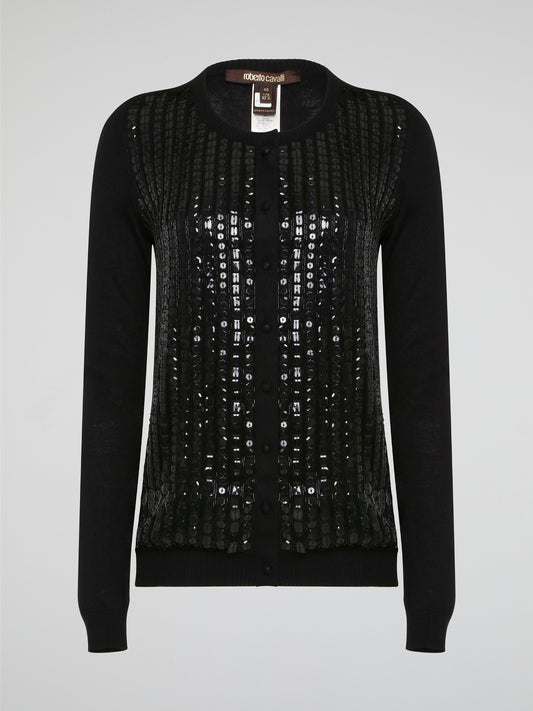 Wrap yourself in luxurious style with this Black Embroidered Cardigan from Roberto Cavalli. Featuring intricate embossed detailing that adds a touch of glamour to any outfit, this cardigan is perfect for layering in the cooler months. Elevate your wardrobe with this statement piece that is sure to turn heads wherever you go.