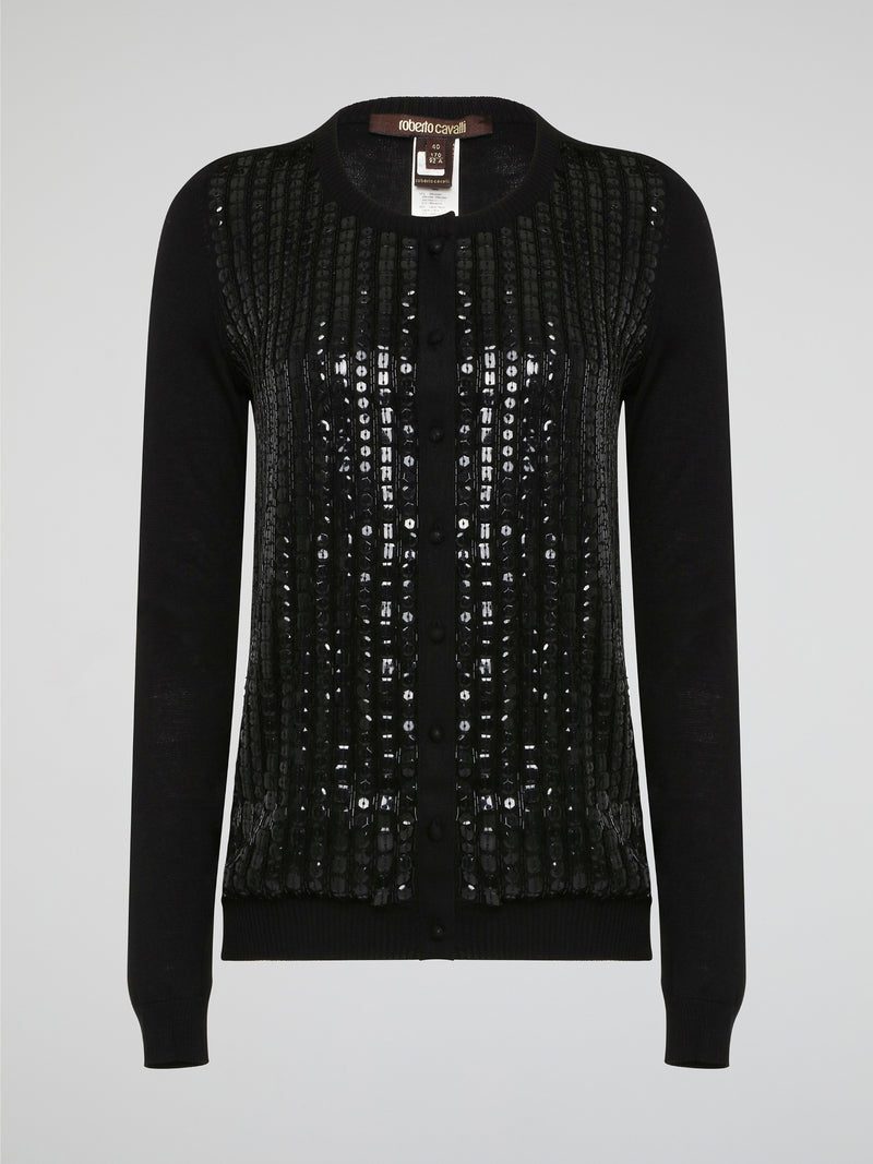 Wrap yourself in luxurious style with this Black Embroidered Cardigan from Roberto Cavalli. Featuring intricate embossed detailing that adds a touch of glamour to any outfit, this cardigan is perfect for layering in the cooler months. Elevate your wardrobe with this statement piece that is sure to turn heads wherever you go.