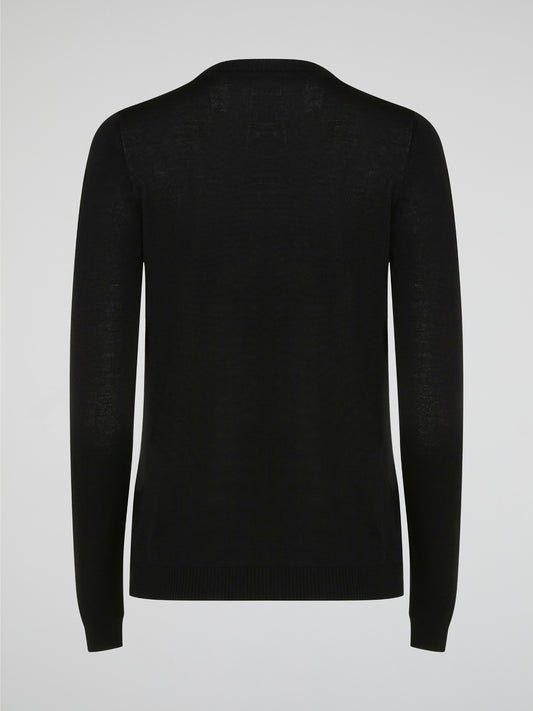 Wrap yourself in luxurious style with this Black Embroidered Cardigan from Roberto Cavalli. Featuring intricate embossed detailing that adds a touch of glamour to any outfit, this cardigan is perfect for layering in the cooler months. Elevate your wardrobe with this statement piece that is sure to turn heads wherever you go.