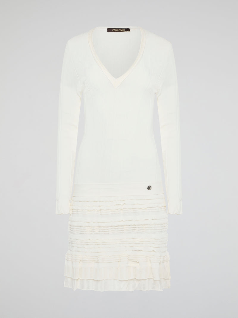 Elevate your winter wardrobe with the luxurious White Knitted Sweater Dress by Roberto Cavalli. This chic and sophisticated piece features intricate knit detailing and a flattering silhouette that will turn heads wherever you go. Whether you're dressing it up with heels for a night out or styling it casually with boots, this sweater dress is sure to make a statement.