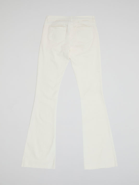 Step into the spotlight with these stunning White Flared trousers from Ki6?who Are You? Made with luxurious and breathable fabric, these trousers will elevate any look with their sleek and sophisticated design. Whether you're dressing up for a night out or keeping it casual during the day, these trousers are a must-have addition to your wardrobe.