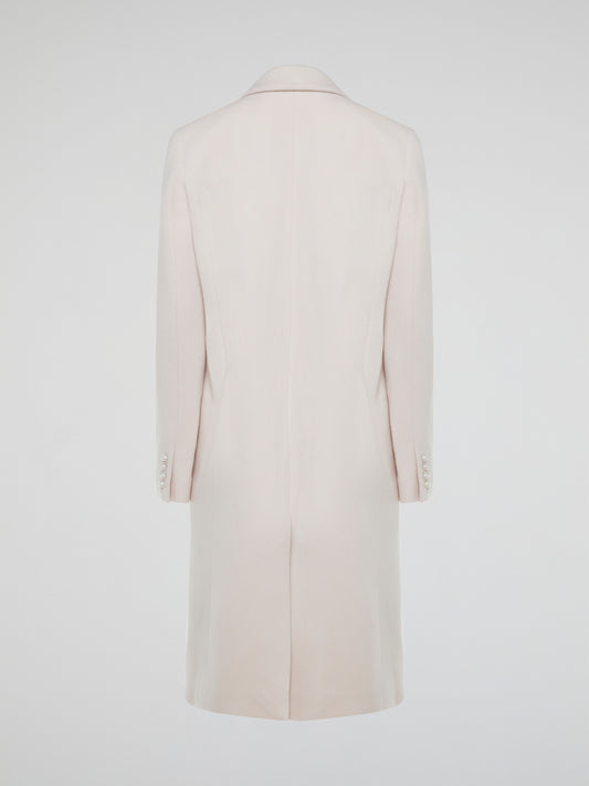 Step out in style with the Powder Pink Trench Coat Nicholas, a chic and sophisticated piece that will elevate any outfit. Its flattering fit and soft pastel hue make it the perfect statement piece for any fashion-forward individual. Be prepared for compliments wherever you go with this stunning wardrobe staple.