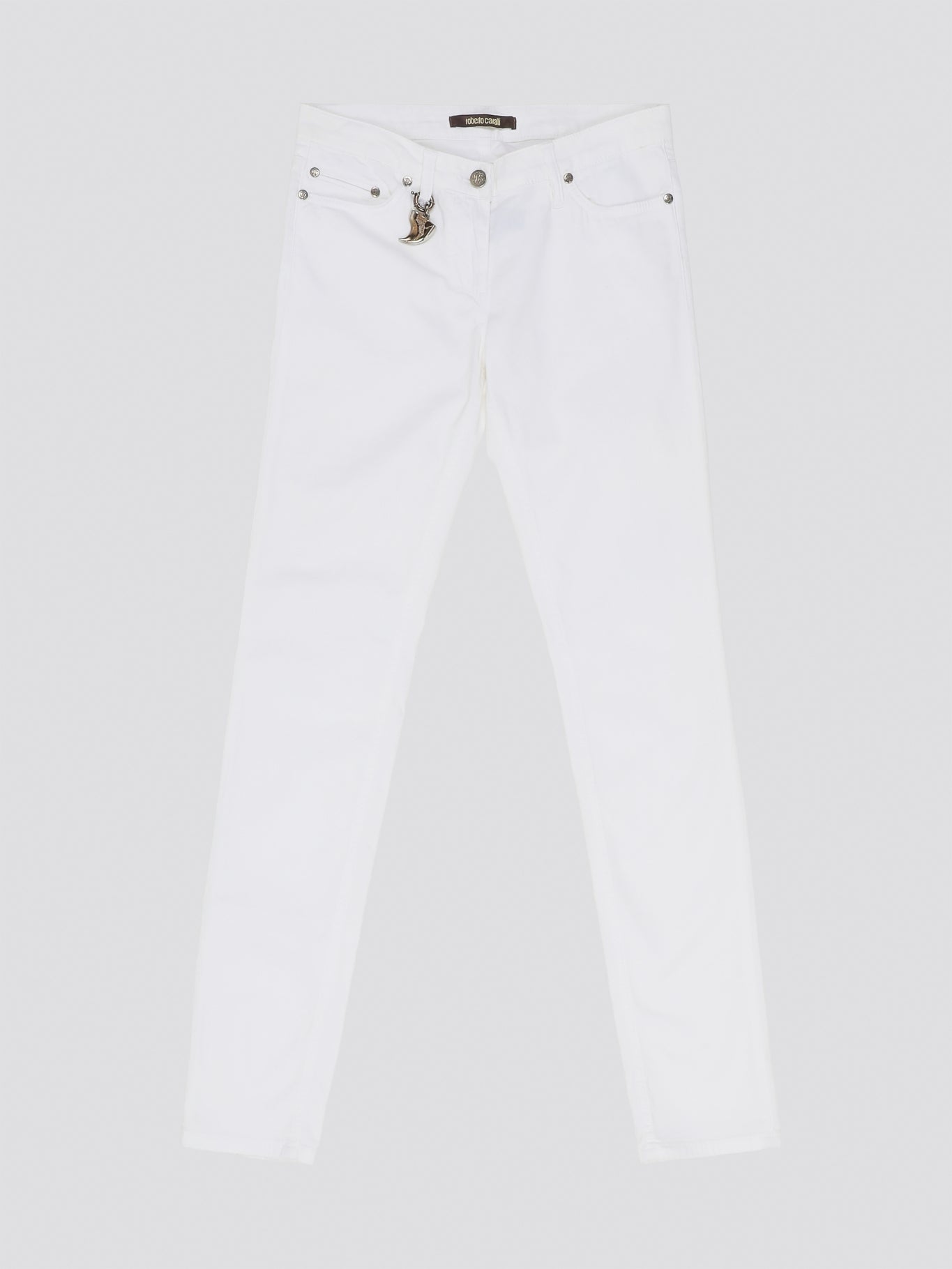 Indulge in timeless elegance and modern sophistication with these White Straight Leg Jeans by Roberto Cavalli. Crafted with precision and attention to detail, these jeans feature a sleek silhouette that effortlessly complements any ensemble. Elevate your everyday wardrobe with a touch of luxury and style with these iconic Roberto Cavalli jeans.