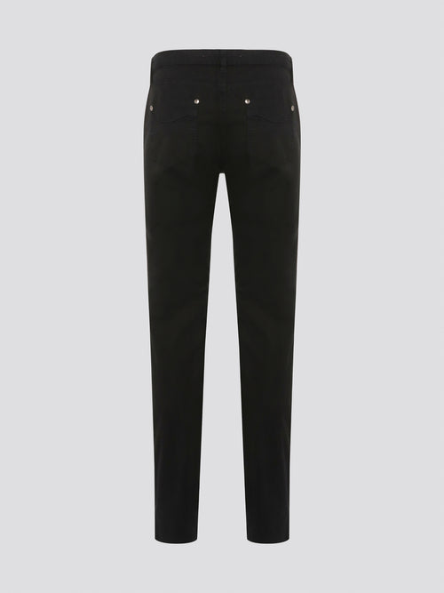 Step out in style with these sleek and versatile Black Skinny Fit Jeans from Roberto Cavalli. Made from premium quality denim, these jeans hug your curves in all the right places while offering unbeatable comfort. Whether dressed up with heels or down with sneakers, these jeans are a must-have for any fashion-forward wardrobe.