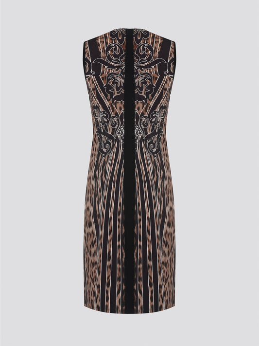 Fade into the wild with the Roberto Cavalli Leopard Print Sheath Dress. This fierce and fabulous statement piece will turn heads wherever you go, exuding confidence and sophistication. Embrace your inner predator and unleash your stylish prowess with this bold and daring dress.