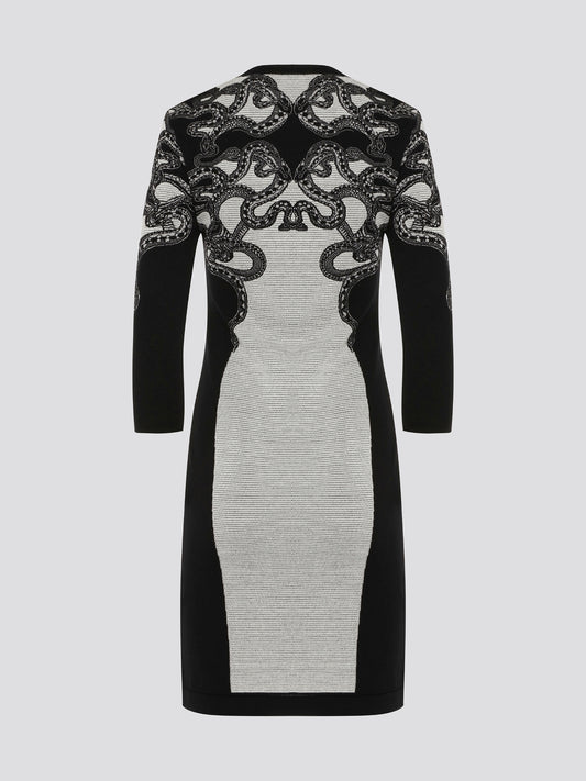 Feel fierce and fabulous in this Roberto Cavalli snake detailed knitted dress. The intricate serpent design adds a touch of exotic glamour to this form-fitting silhouette. Step out in style and make a statement in this one-of-a-kind piece.