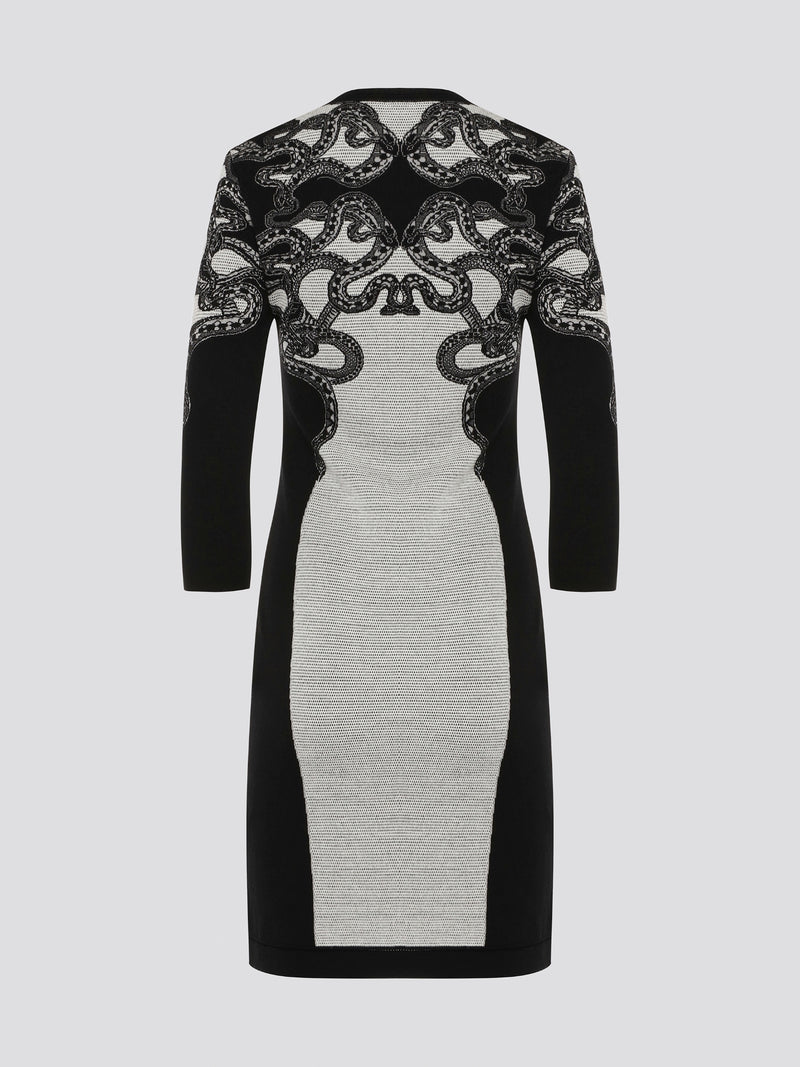 Feel fierce and fabulous in this Roberto Cavalli snake detailed knitted dress. The intricate serpent design adds a touch of exotic glamour to this form-fitting silhouette. Step out in style and make a statement in this one-of-a-kind piece.