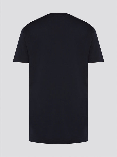 Make a bold fashion statement with the Black Statement Logo Print T-Shirt Dress by Roberto Cavalli. This edgy and luxurious piece features a striking logo print that will turn heads wherever you go. Pair it with some killer heels for a night out, or dress it down with sneakers for a casual, yet chic look. So why blend in when you can stand out in style with this must-have dress.