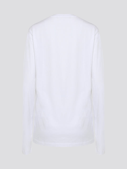 Elevate your wardrobe with the timeless sophistication of the Roberto Cavalli White Printed Long Sleeve Shirt. Made from luxurious, high-quality fabric, this shirt features a captivating print that adds a touch of modern flair to your look. Whether worn casually or dressed up for a night out, this shirt is sure to make a statement and turn heads wherever you go.