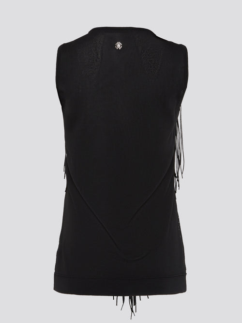 Make a statement with this stunning Black Fringe Detailed Top by Roberto Cavalli. Embellished with intricate fringe detailing, this top exudes luxury and elegance. Whether paired with jeans for a casual look or dressed up with a sleek skirt for a night out, this top is sure to turn heads wherever you go.