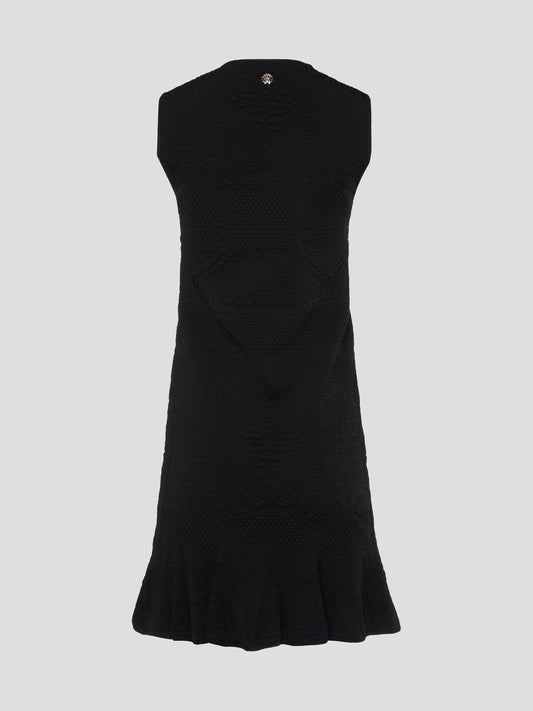 Get ready to turn heads with this stunning black sleeveless mini dress from Roberto Cavalli. This sleek and stylish design features a flattering silhouette that hugs your curves in all the right places. Whether you're hitting the town or attending a special event, this dress is sure to make a statement and elevate your look to the next level.