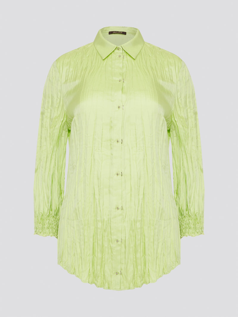 Step into the wild side with this striking green crinkled shirt from Roberto Cavalli. The vibrant hue and unique texture of the fabric will ensure you stand out from the crowd wherever you go. Embrace your fearless fashion sense and unleash your inner style icon with this must-have statement piece.