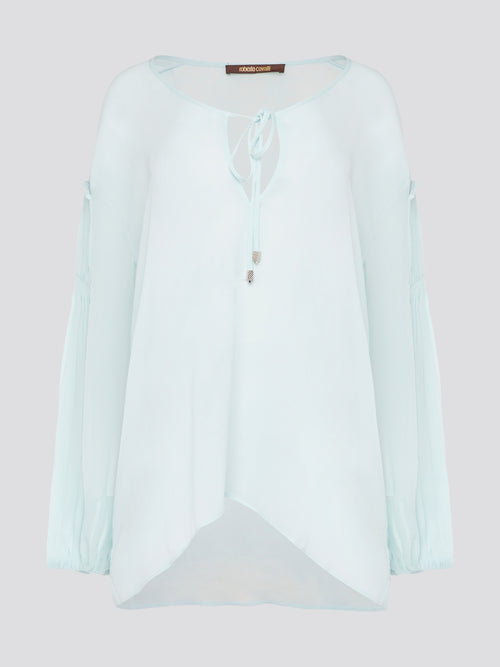 Step up your fashion game with this stunning Mint Green Tie Front Blouse by Roberto Cavalli. The delicate mint green hue and flattering tie front detail will make you stand out in any crowd. Pair it with your favorite jeans for a casual daytime look or dress it up with some sleek trousers for a night out on the town.