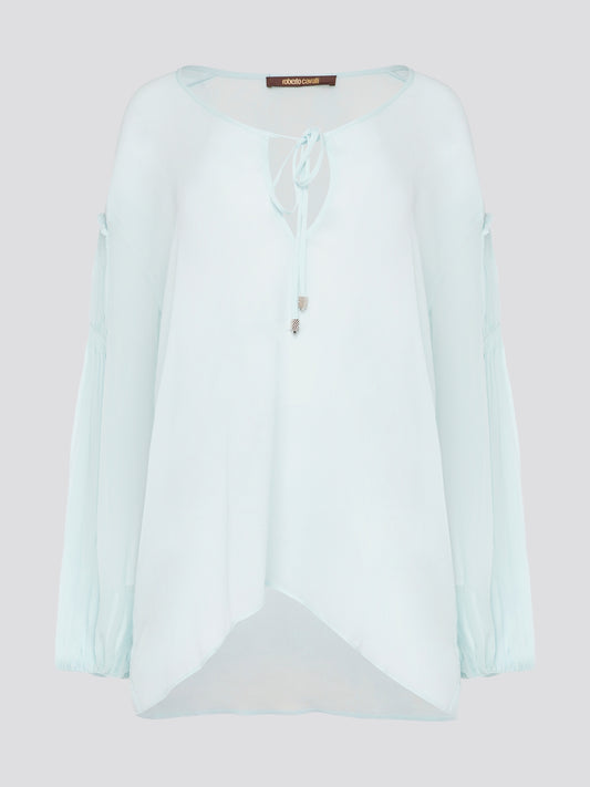Step up your fashion game with this stunning Mint Green Tie Front Blouse by Roberto Cavalli. The delicate mint green hue and flattering tie front detail will make you stand out in any crowd. Pair it with your favorite jeans for a casual daytime look or dress it up with some sleek trousers for a night out on the town.